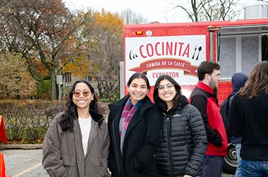 students in front of the La Cocinita Food Truck